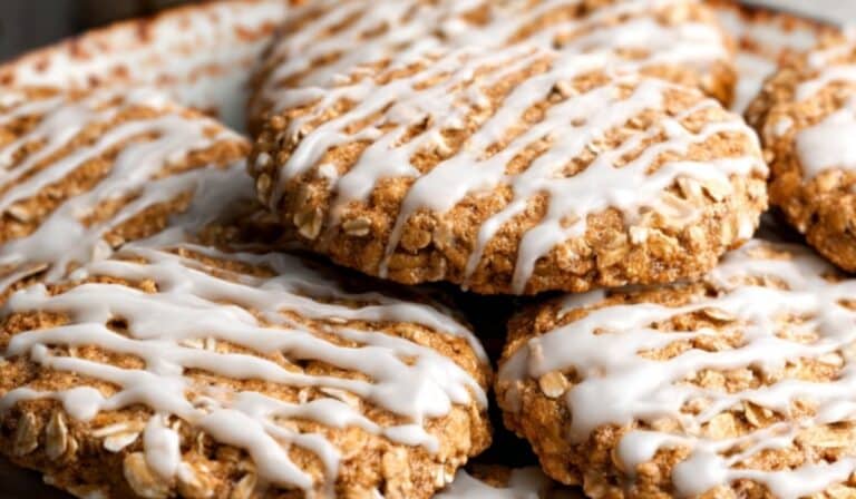 Iced oatmeal cookies with classic glaze on rustic plate