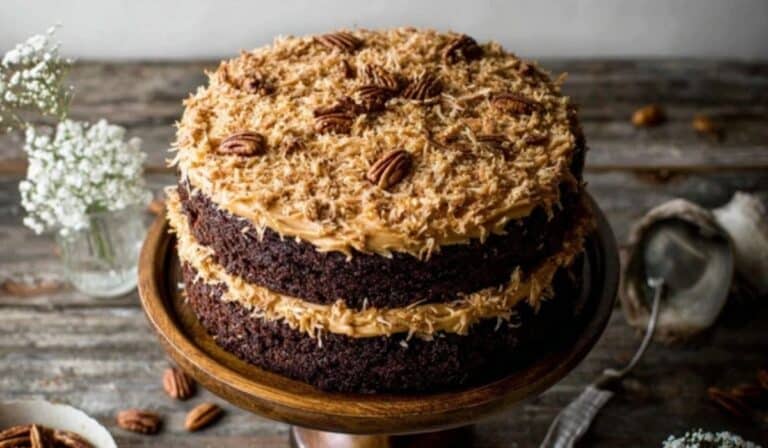 German Chocolate Cake topped with coconut-pecan frosting