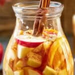 Apple Cider Autumn Sangria served on a rustic fall table