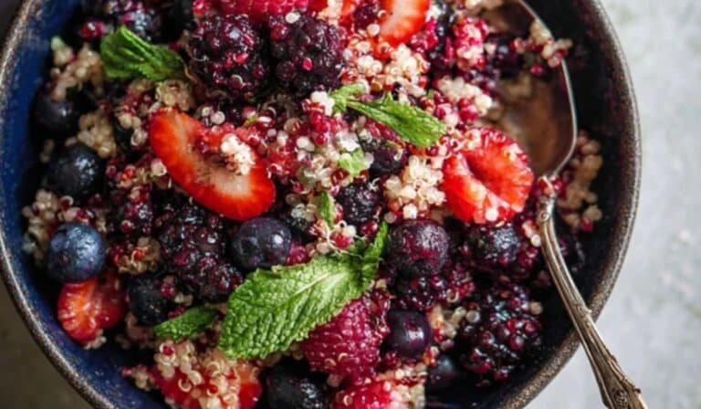 Fresh Berry Quinoa Salad in rustic bowl