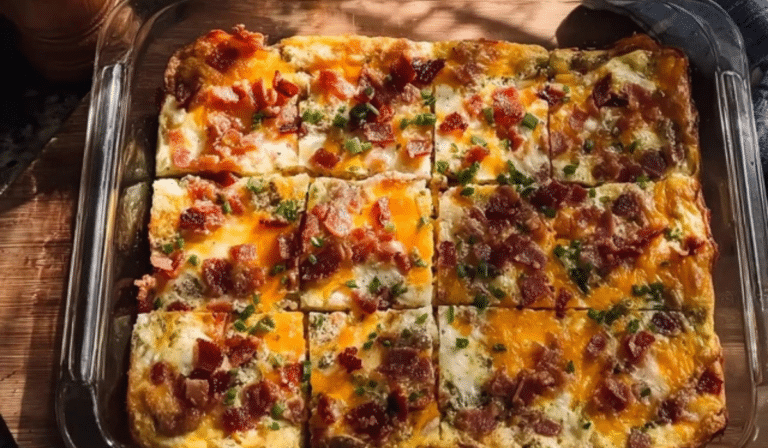 Charleston Breakfast Casserole sliced with bacon and cheddar